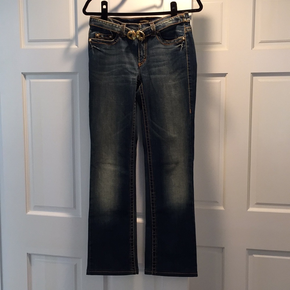 Roberto Cavalli jeans w/ gold and crystal buckle.